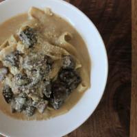 Side Of Pasta · Fettuccine with parmesan mushroom cream sauce