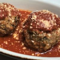 Homemade Meatballs · Two large fresh homemade meatballs served with our housemade marinara and topped with fresh ...