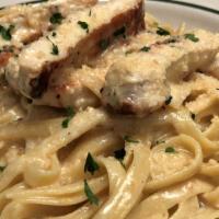 Chicken Fettuccine Alfredo · Our House-Made Alfredo Cream Sauce with Grilled Chicken - Tossed w/ Fettuccine