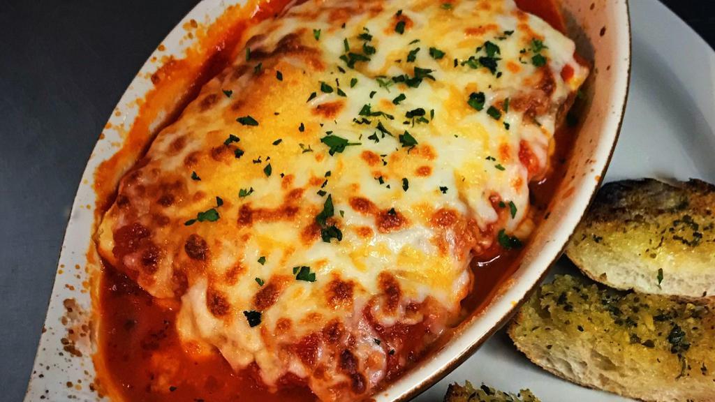 Lasagna Al Forno · Traditional with ground beef, ricotta, Parmesan, and mozzarella baked in our housemade marinara.