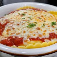 Ravioli Al Forno · Cheese Ravioli w/ your choice of sauce -  topped with parmesan & mozzarella cheeses and bake...