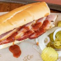 Bbq Po-Boy · Served on fresh French bread with BBQ sauce on the side.