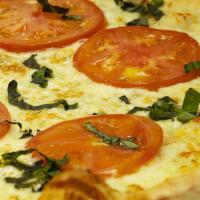 Margherita Pizza · Garlic & Basil sauce, Fresh tomatoes, Fresh basil and Mozzarella cheese.