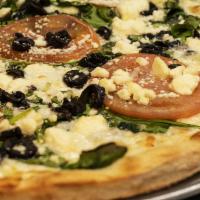 Greek Pizza · Garlic & Basil sauce, Fresh tomatoes, Black olives, Fresh spinach, Feta cheese and Mozzarell...
