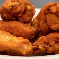 Jumbo Wings (10Ct) · Mouth watering wings tossed in . our unique signature sauces. Served with ranch!