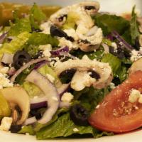 Greek Salad · Freshly chopped romaine topped with feta cheese, fresh mushrooms, red onions, black olives, ...