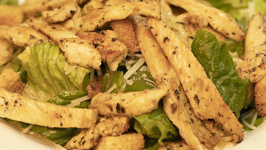 Grilled Chicken Caesar · Classically prepared romaine lettuce with grilled chicken topped with herb infused croutons & imported parmesan cheese.
