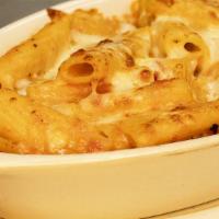 Baked Ziti · Penne Rigate pasta made with cream sauce, herbs, marinara sauce and mozzarella cheese.