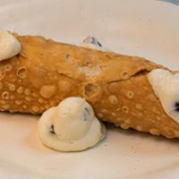 Cannoli · Traditional handmade cannoli shells filled with delicious chocolate chip cannoli cream.