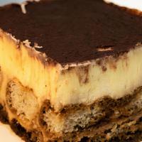 Tiramisu · Layers of mascarpone cream and ladyfingers soaked in espresso then finished with a dusting o...