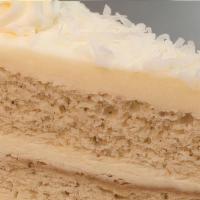 Italian Cream Cake · Moist white cake with pecans topped with delicious cream cheese icing and coconut shavings