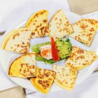 Quesadilla · Served with rice and beans.
