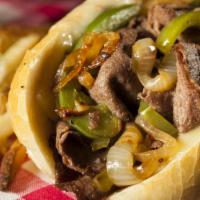 Philly Cheesesteak · Classic philly cheesesteak filled with grilled onions, green peppers, sautéed mushroom & may...
