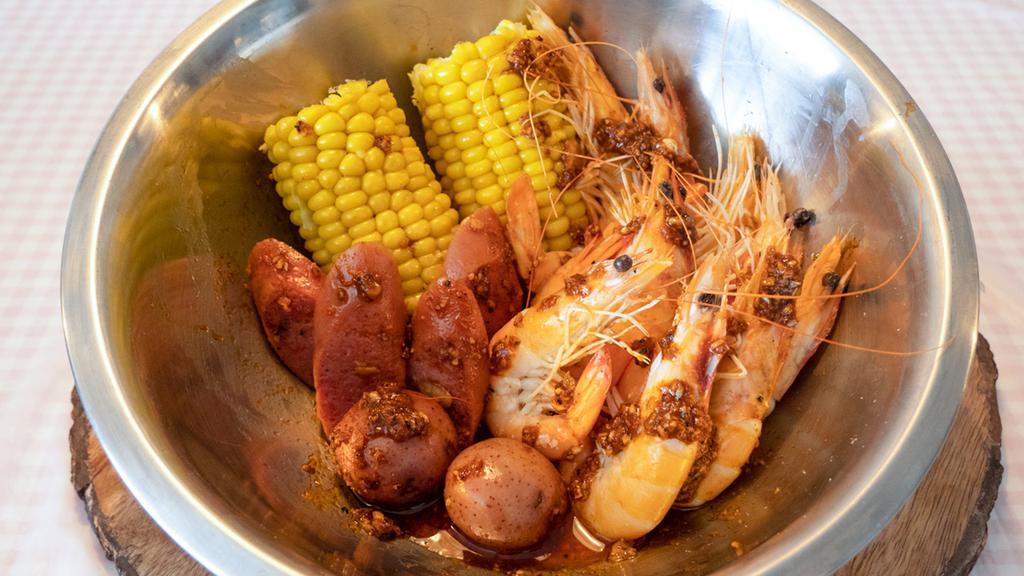 Shrimp Combo · 1lb Whole Shrimp, 1/2lb Sausage, Red Potatoes and Two Corn on the Cob. 
ALL OUR BOILS COME WITH OUR CAJUN HOME SAUCE