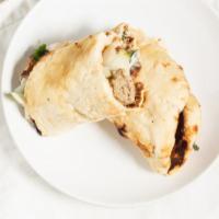 Kebab Roll · Beef or chicken. Shish kebab, tomatoes, onions, and cucumber sauce wrapped in naan.