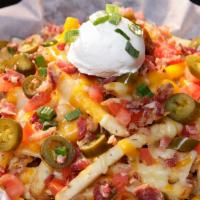 Funky Fries · French fries at their finest! Fresh crisp fries smothered in a culmination of shredded jack ...