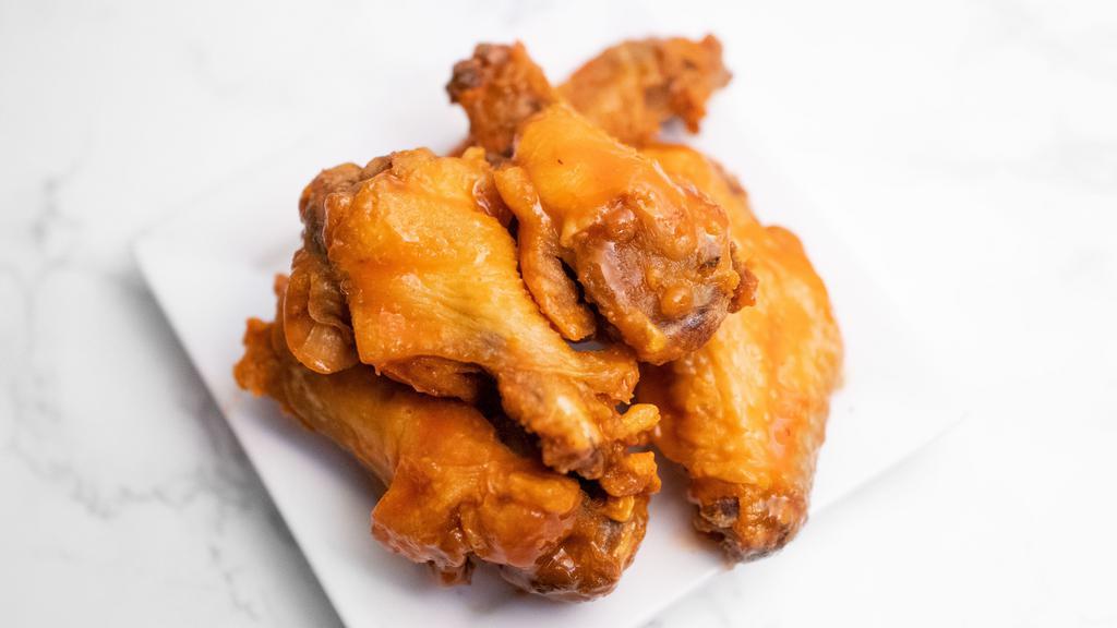 Wings Bone-In (5) (1 Sauce) · Consuming raw or undercooked meat, poultry, seafood, shellfish, or eggs may increase the risk of foodborne illness.