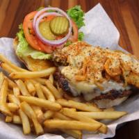 Fiery Green Chile Cheeseburger · 1/2 pound seasoned beef patty covered in melty pepper jack cheese, a crispy breaded hatch gr...