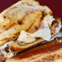 Buffalo Chicken · Grilled chicken, spicy wing sauce, ranch, smoked provolone.