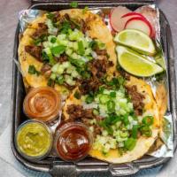 Suadero / Suadero · (4) Tacos de suadero acompanados de cebollitas asadas (cambray) pepino cebolla cilantro y sa...
