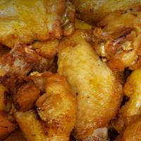 Wings · Halal Certified. Deep-fried chicken wings with sauce. Wings are baked brick oven – everythin...