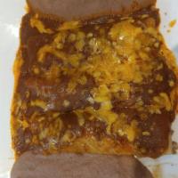 Ground Beef Enchiladas · Served with rice and beans.