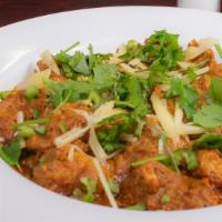 Chicken Karahi · Best in DFW. Thick gravy made with a traditional blend of spices and fresh tomatoes.