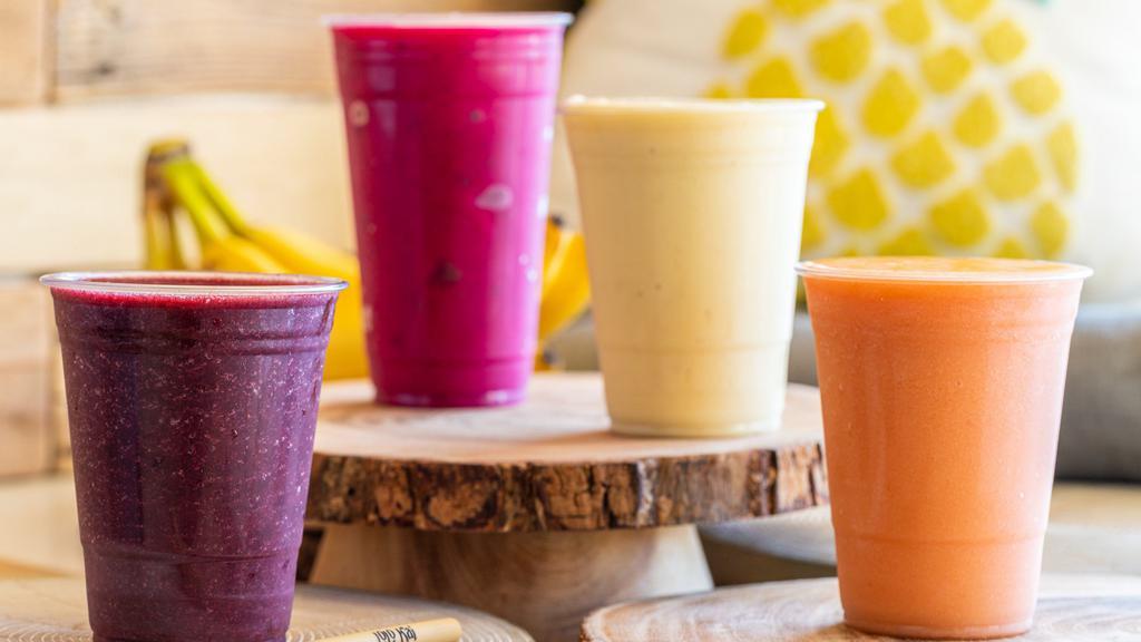 Pitaya Smoothie · Passion fruit juice, coconut milk, pitaya, mangos, bananas, and pineapples.