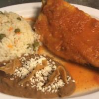 Poblano Pepper · Stuffed poblano pepper. Served with rice and beans.