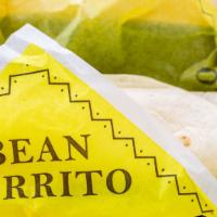 Bean Burrito · A large steamed flour tortilla filled with refried beans, mild or spicy sauce, and real ched...