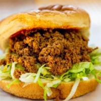 Chili Burger · A steamed fresh bun with a splash of our mild red sauce, a scoop of 100% ground beef, and to...