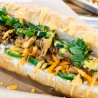 Banh Mi Sandwich · a french baguette filled with your choice of protein, cucumbers, pickled carrots and daikon,...