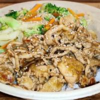 Chicken Teriyaki Bowl · Chicken tossed in our signature teriyaki sauce with mixed veggies (broccoli, cabbage & carro...
