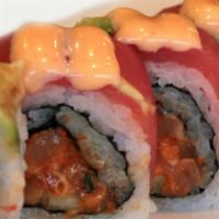 Red Dragon · Spicy salmon topped with tuna, avocado and spicy cream sauce.