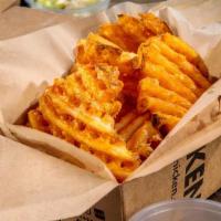 Waffle Fries · Lattice shaped fried potatoes.
