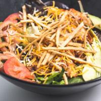 Southwest Salad · BBQ chicken, shredded cheese, tomato, avocado, tortilla strips, chopped romaine, spring mix ...