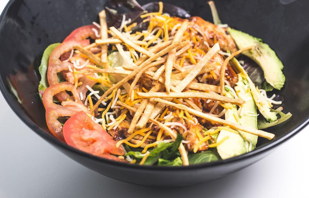 Southwest Salad · BBQ chicken, shredded cheese, tomato, avocado, tortilla strips, chopped romaine, spring mix and ranch dressing.