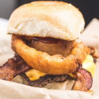 Holy Smokes · BBQ sauce, bacon, onion rings and American cheese.