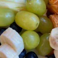 Fruit Box · Berries, apple slices, banana slices, grapes, orange