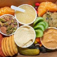 Vegan Snack Box · Nut/seed medley, hummus, peanut butter, celery, carrots*, olives, pickle, beet crackers* and...