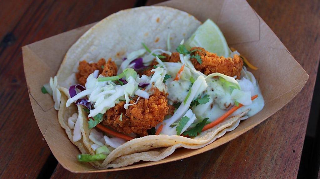 #10 Fried Chicken · Hand battered chicken breast with jalapeno ranch, slaw and cilantro.