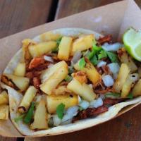 #9 Rusty · Achiote pork, grilled pineapple relish, diced onion, cilantro.