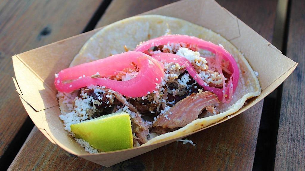 #2 Roasted Pork · Smoked green chile pork, cotija cheese, pickled red onions.