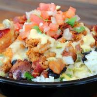 #10 Fried Chicken Bowl Team Fave · Topped with hand battered chicken breast topped with our awesome queso, bacon and pico de ga...