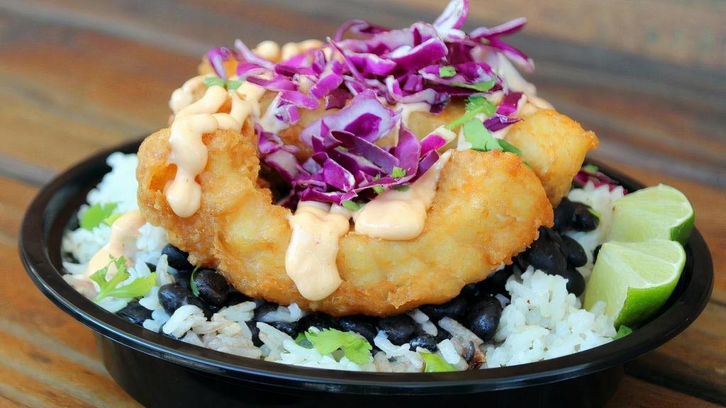 #7 Fish (Crispy) Bowl · Topped with tempura battered cod, baja sauce, red cabbage, cilantro.
