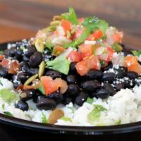 #12 Black Bean Bowl · Topped with chipotle black beans, pico, cotija cheese, cilantro, toasted pumpkin seeds.