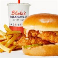Blake'S Sandwich Meal · Two tender strips blake’s sauce & pickles on a gourmet bun side and drink.