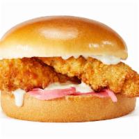 Ranch Chicken Sandwich · Two tender strips ranch and pickled onions on a gourmet bun.