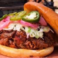 The Tex Mex · Tex-Mex is a pulled pork sandwich sauced and loaded with jalapenos, coleslaw and housemade o...