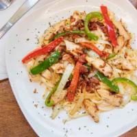 Carbonara · Sautéed bacon, chicken, caramelized onion, bell peppers, and alfredo sauce tossed with lingu...